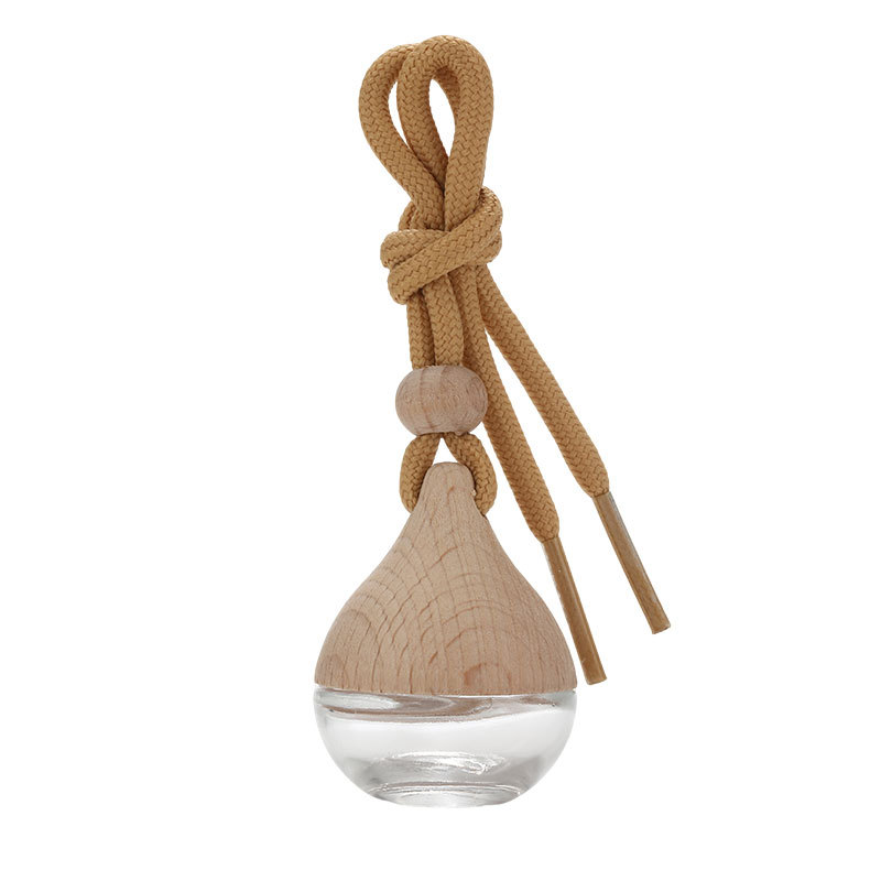 Clear rounded car diffuser bottle with teardrop wooden cap and tan hanging cord